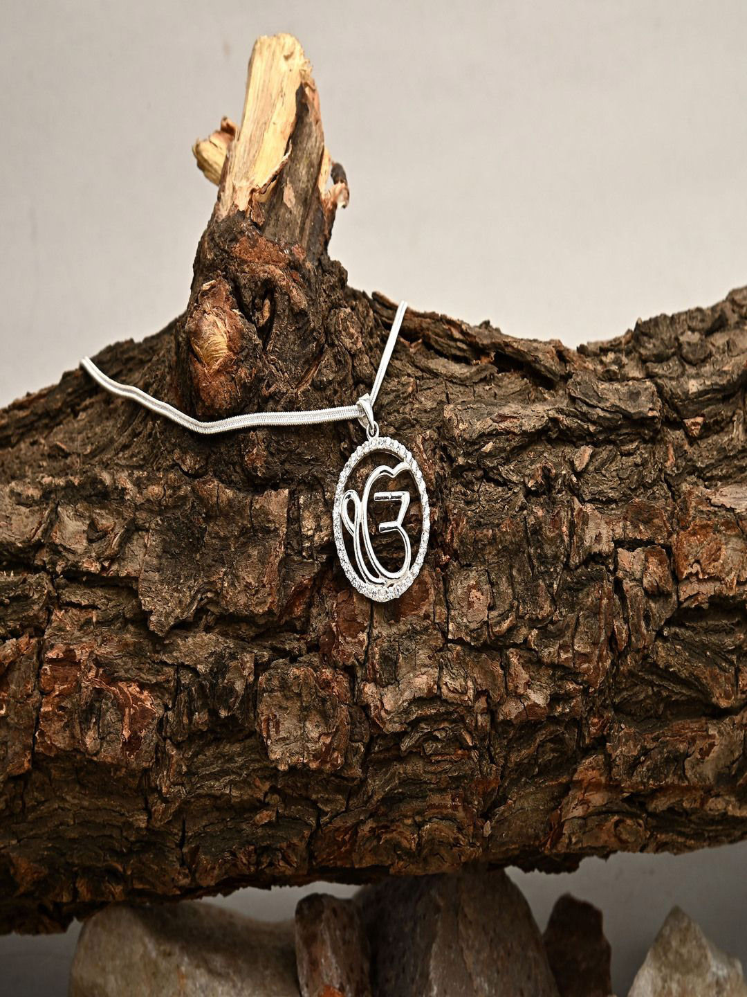 Paavni 925 Sterling Silver Cubic Zirconia Studded Circular Shaped Ek Onkar Pendant