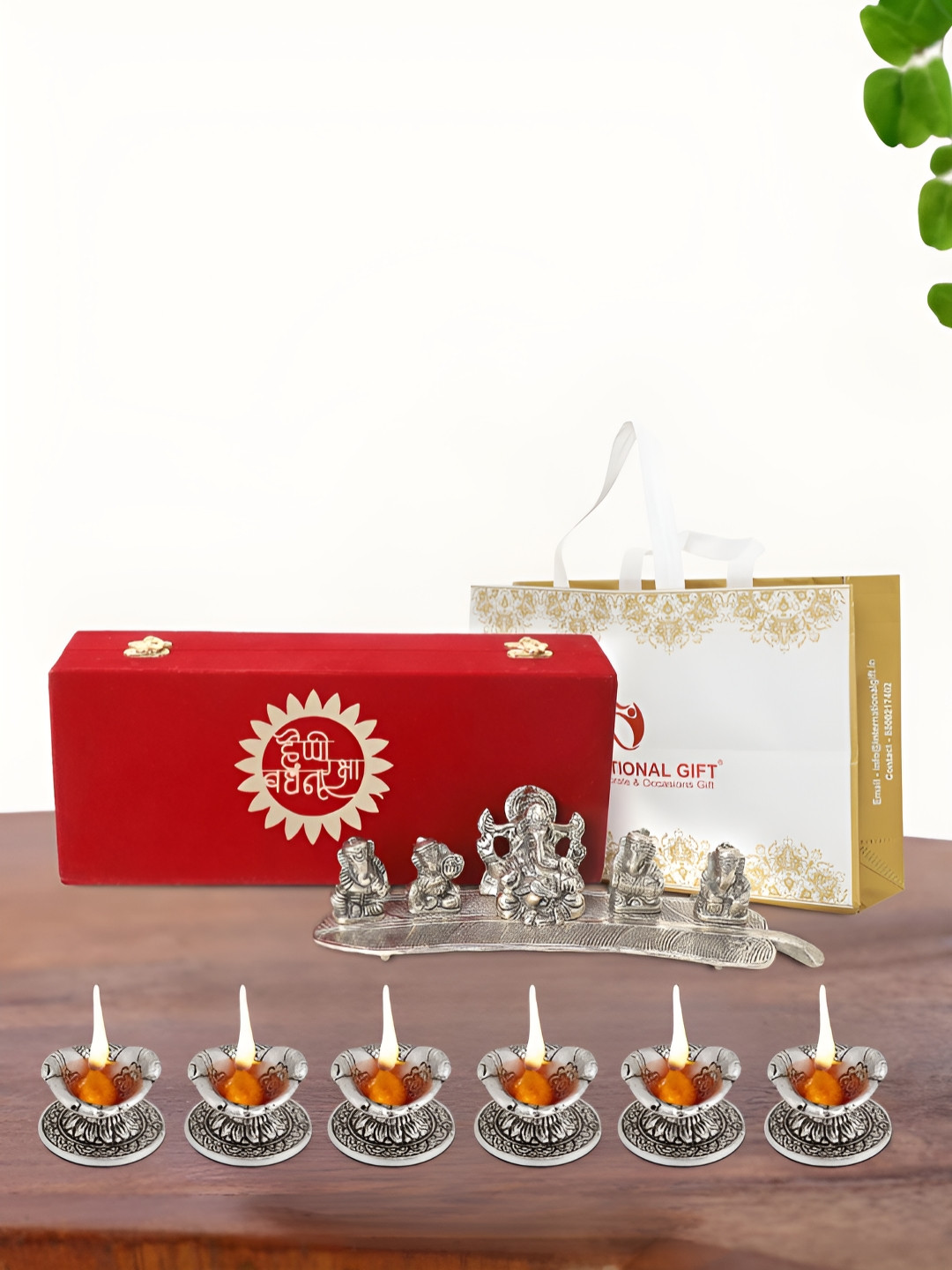 INTERNATIONAL GIFT Musical Ganesh Idol with 6 Diya, Velvet Box and Carry Bag Silver Metal Metallic Prayer Room Music Small Showpiece - 1.2 Inches