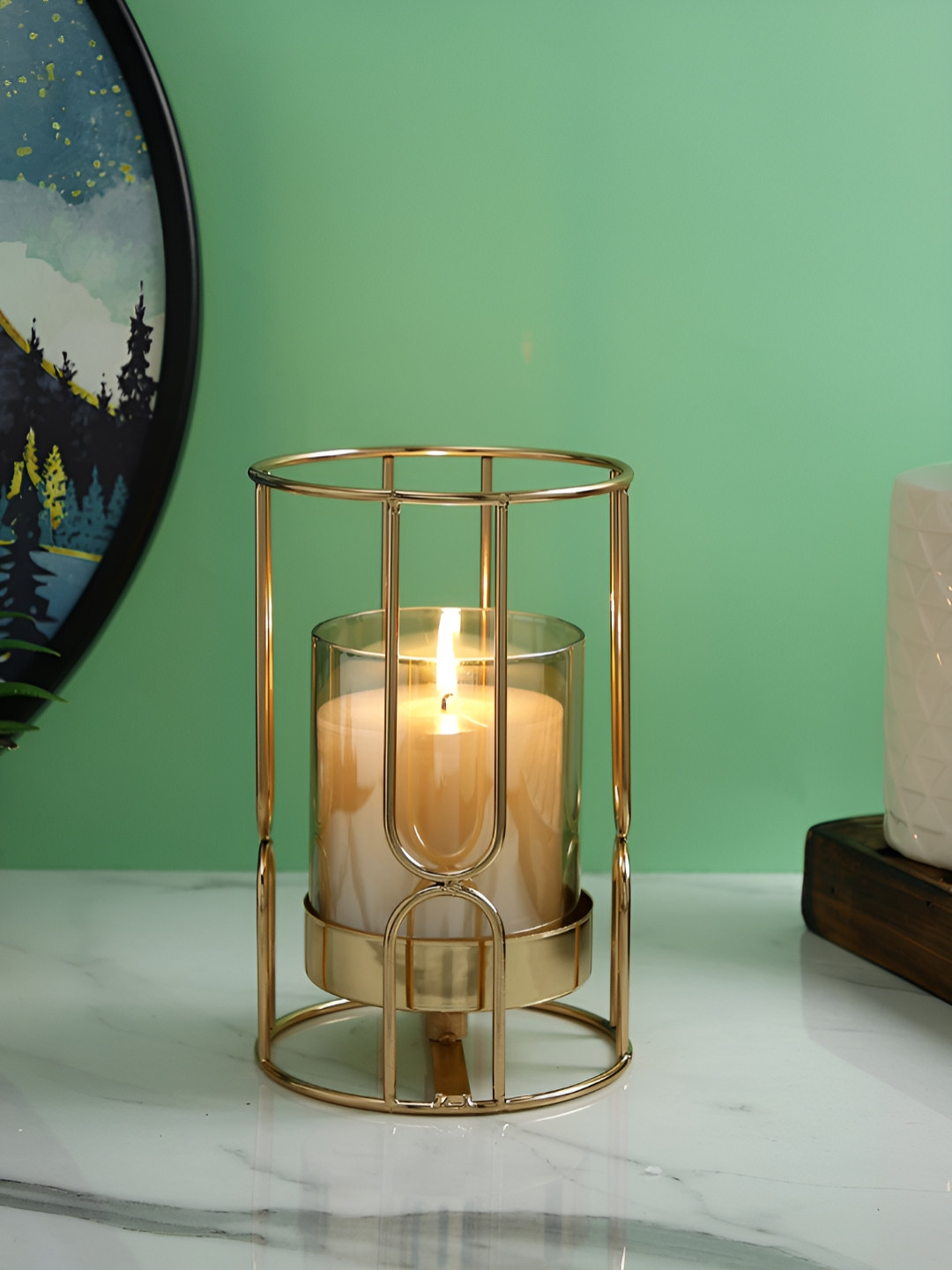 Myntra Elegant Homes Gold-Toned Glass Candle Holder