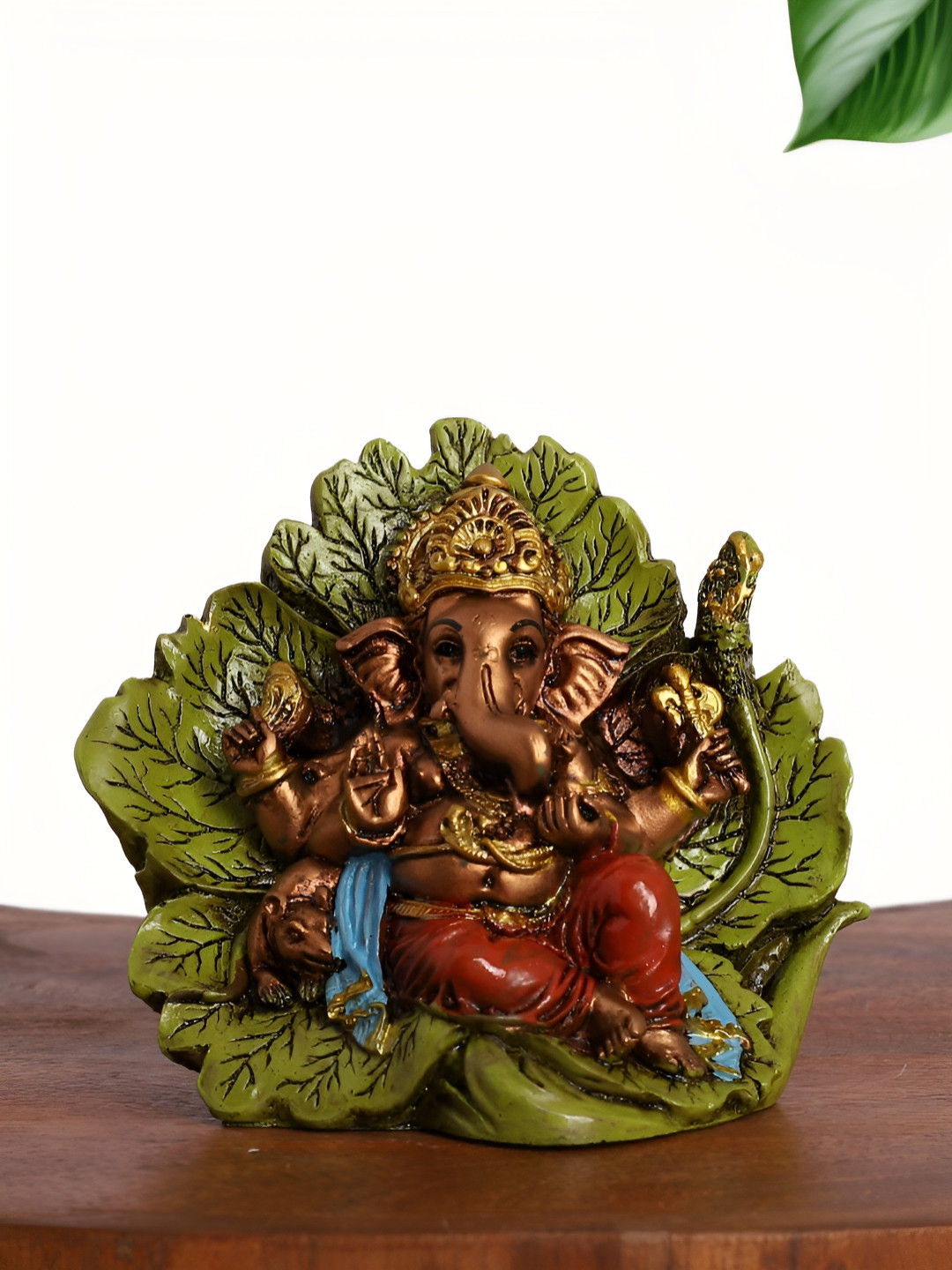 INTERNATIONAL GIFT Lord Ganesha Seated on Leaf Throne with Modak Green Polyresin Natural Prayer Room Small Showpiece - 6 Inches