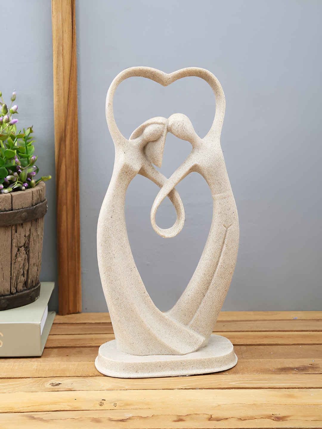 Myntra Elegant Homes Strong Courtship Of Love Beige Polyresin Matte Living Room Medium Showpiece - 11.4 Inches