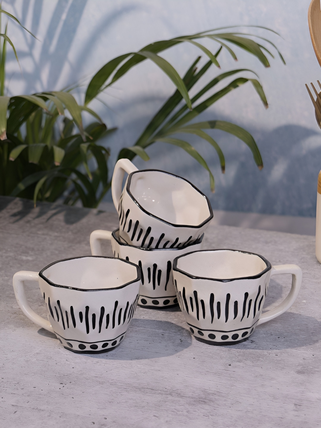 Myntra Elegant Homes Off White & Black 4 Pieces Tribal Printed Ceramic Tea Cups 200 ml