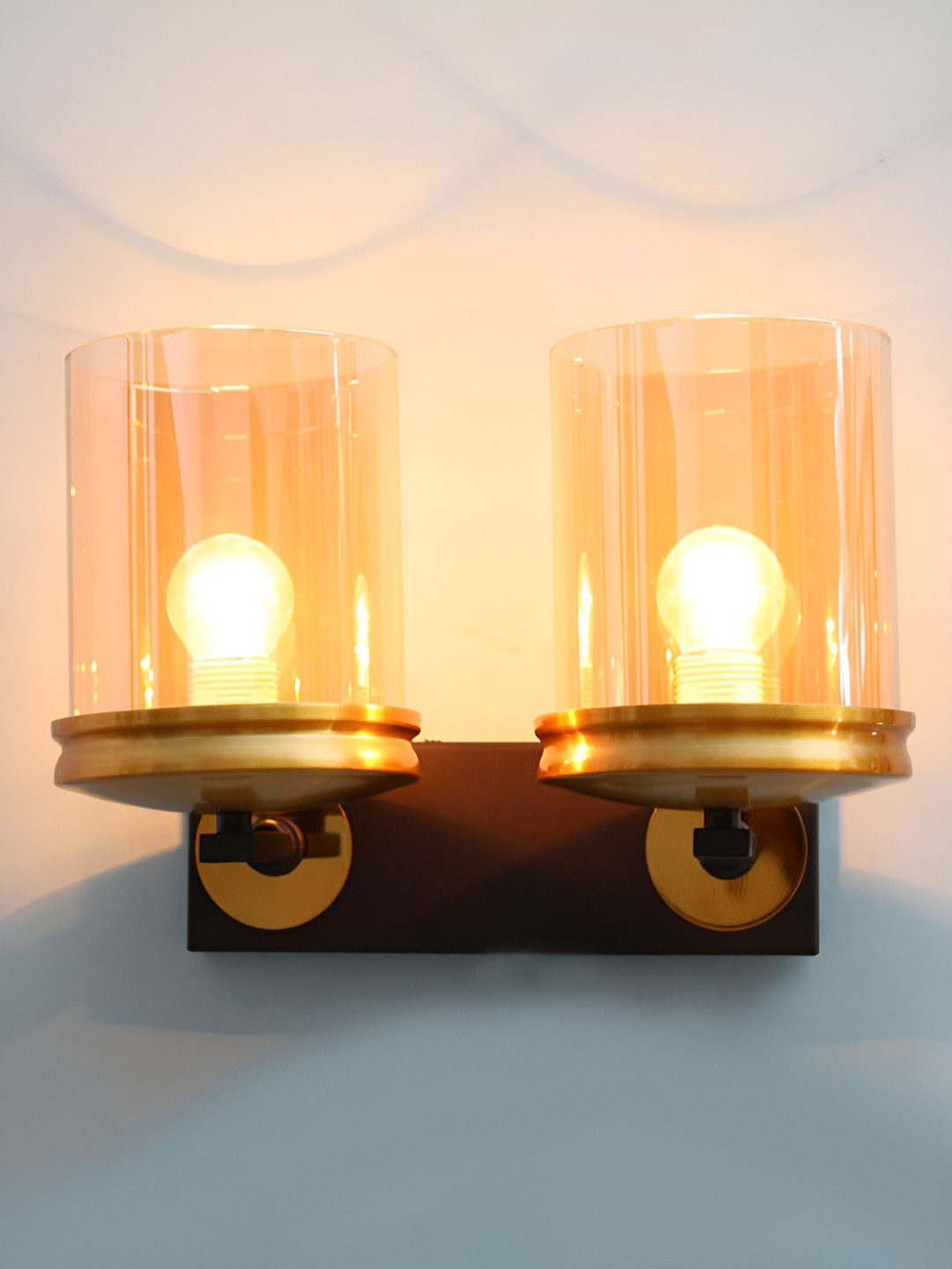 SHREE KALA HOME DECOR Gold-Toned Modern Double Arm Wall Lamp With Amber Glass