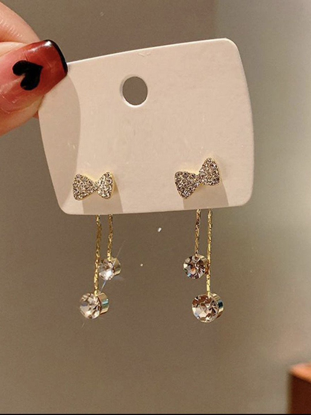 Celestique Artificial Stones Studded Bow Tassel Contemporary Shaped Korean Drop Earrings
