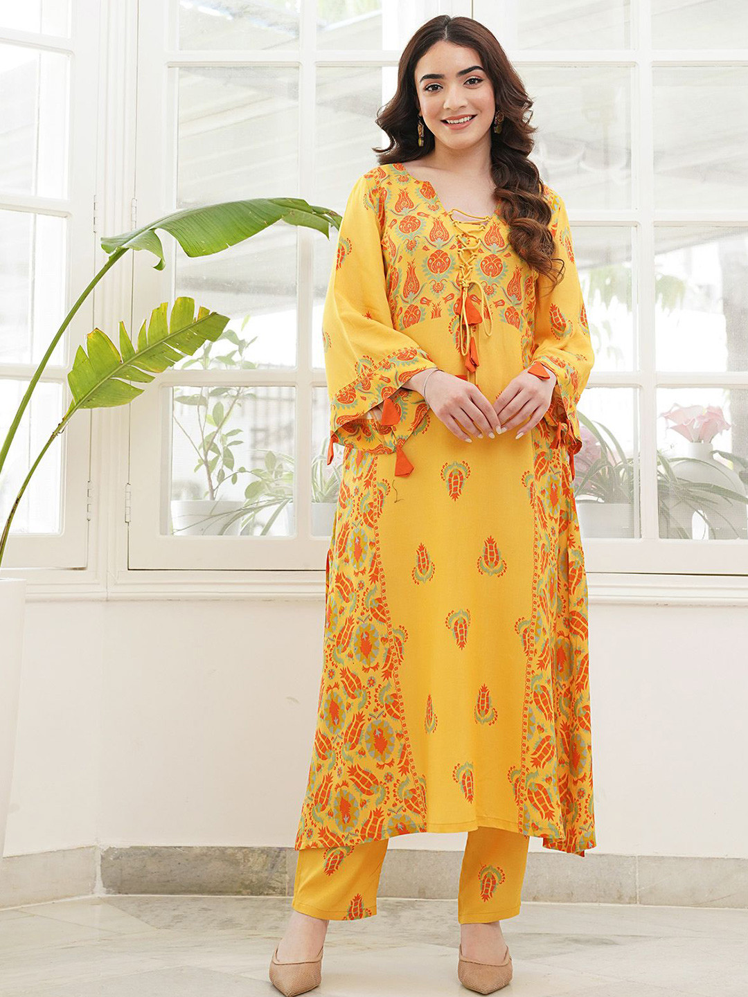Rustorange Printed Tie Up Neck Flared Sleeves Pure Cotton V-Neck Paneled Kurta Pant Set