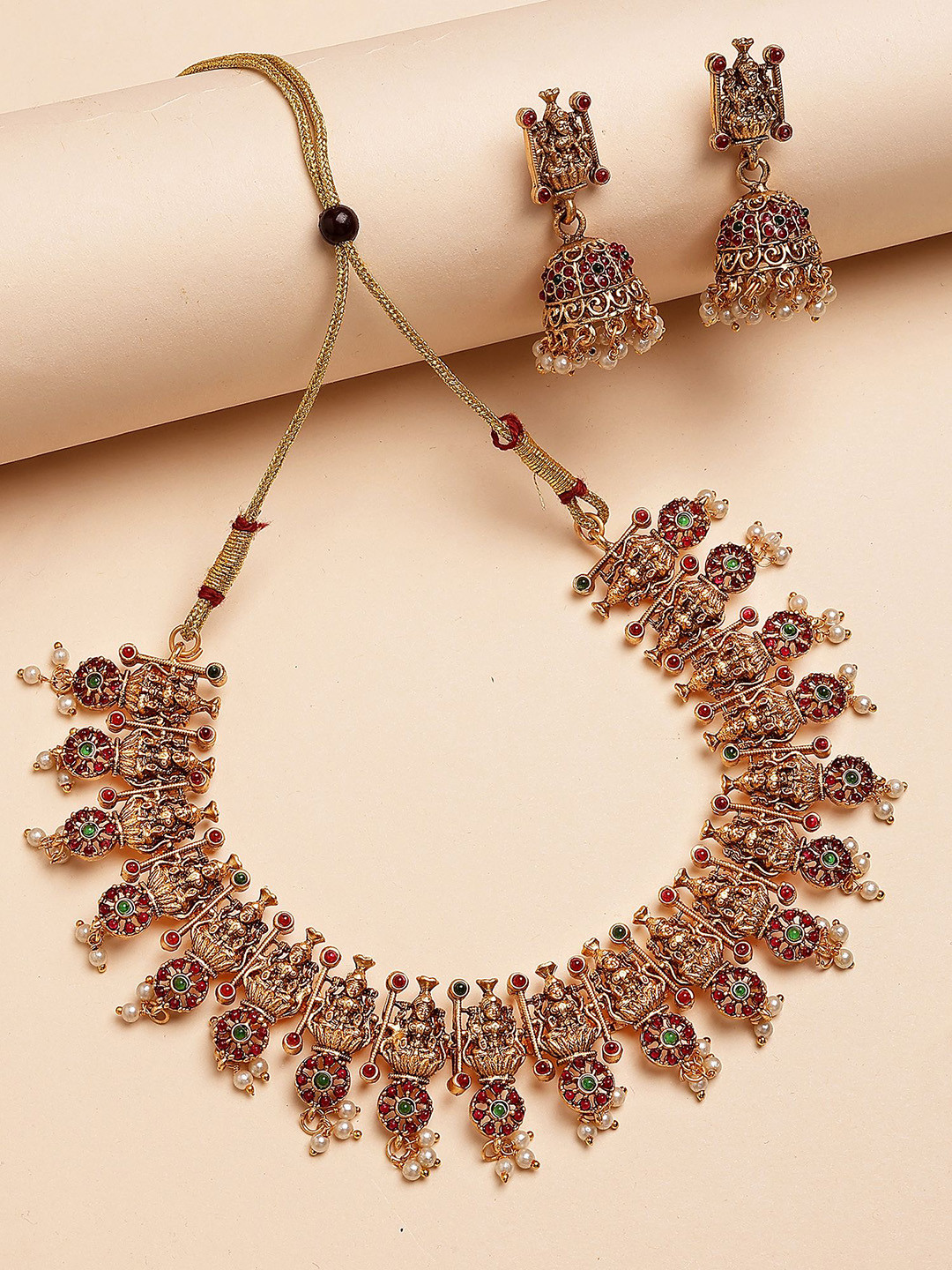 KARATCART Gold-Plated Kundan Studded Laxmi Mata and Floral Temple Necklace and Earrings