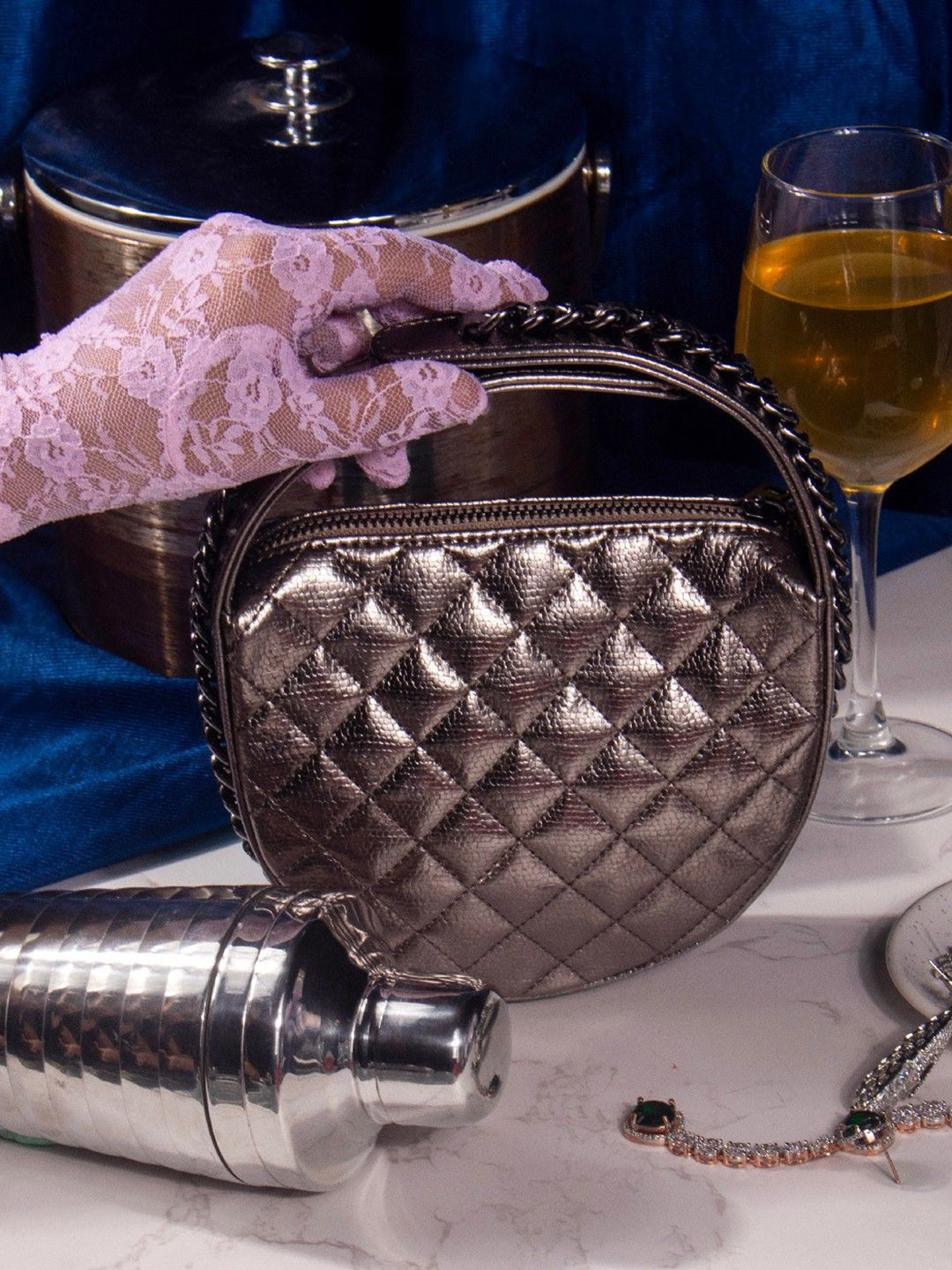 Suave Bags The Chome Synthetic Leather Half Moon Handheld Bag