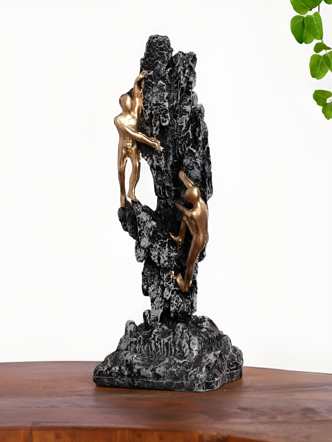 INTERNATIONAL GIFT Men Climb Ston on Mountain Black Polyresin Glossy Living Room Medium Showpiece - 3.7 Inches