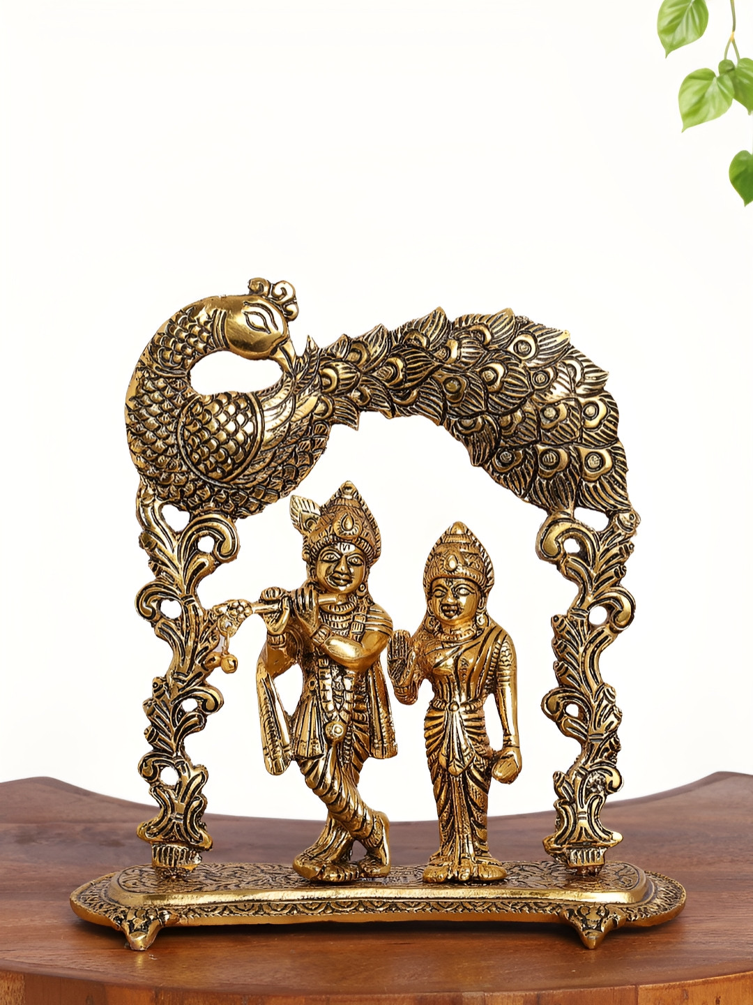 INTERNATIONAL GIFT Radha Krishna with Peacock Arch Frame Gold Polyresin Natural Prayer Room Medium Showpiece - 3.1 Inches