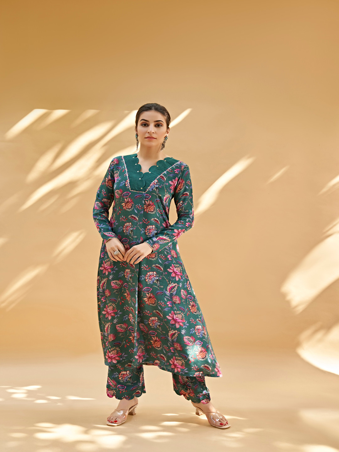 SUKRUTI DESIGN Floral Printed Sequinned A Line Kurta With Trousers