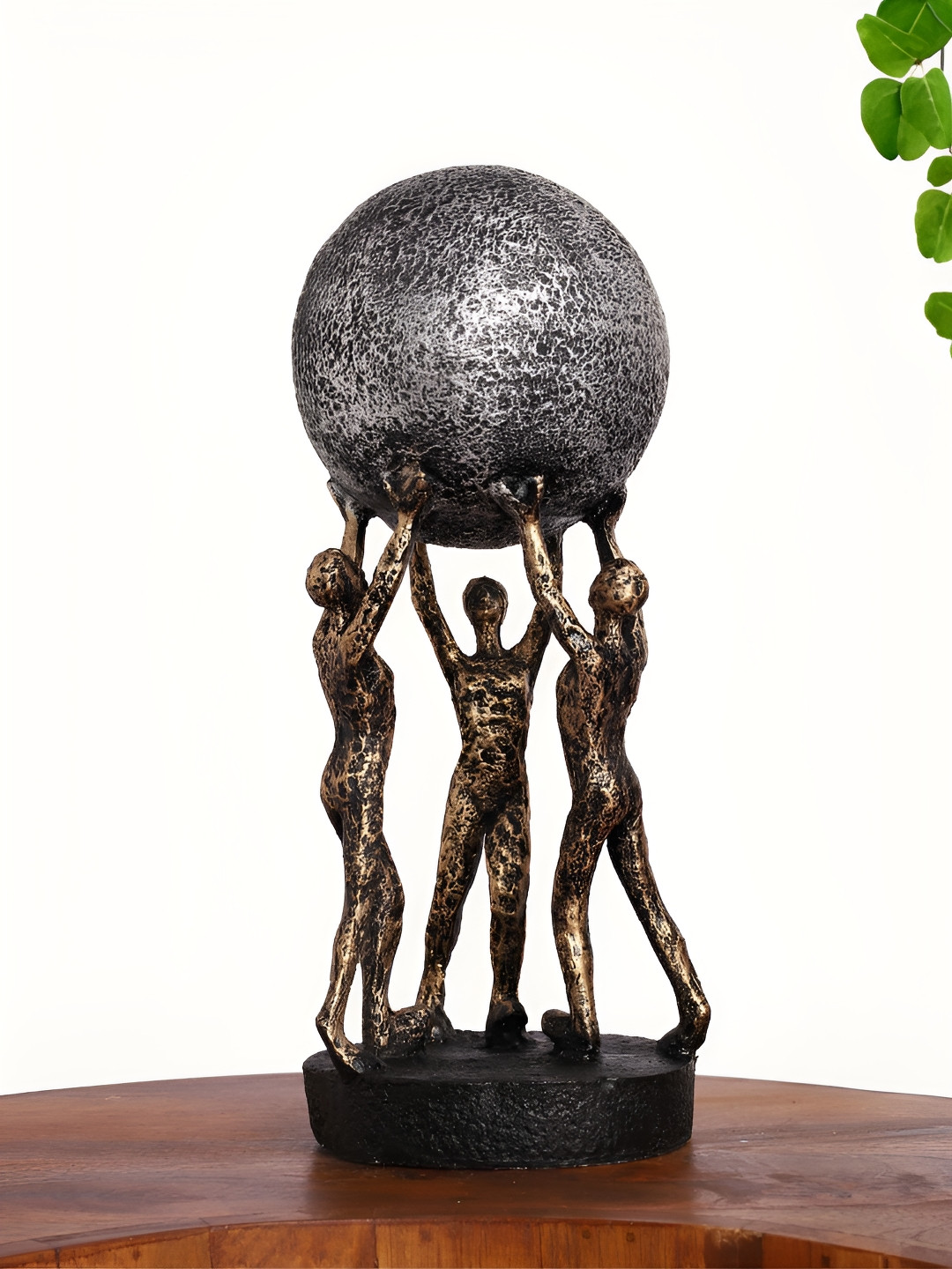 INTERNATIONAL GIFT Men Holding Ball Gold Polyresin Glossy Living Room Medium Showpiece - 12 Inches