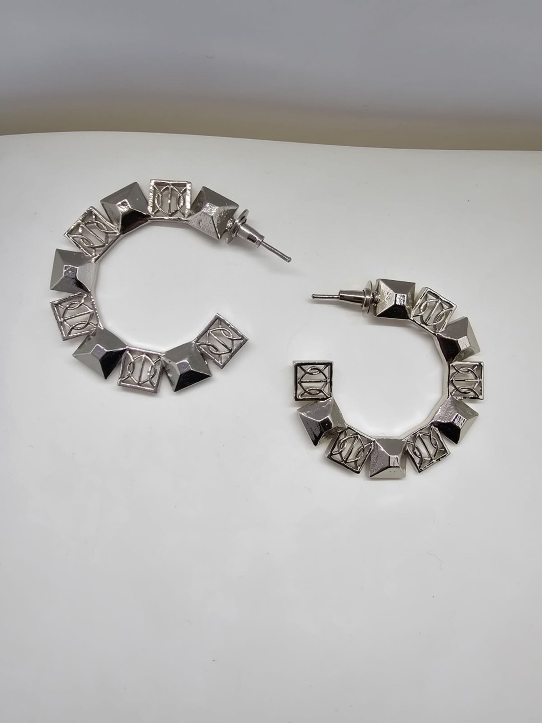 GAURISH BESPOKE JEWELLERY Silver-Plated Zircon Crescent Shaped Hoop Earrings