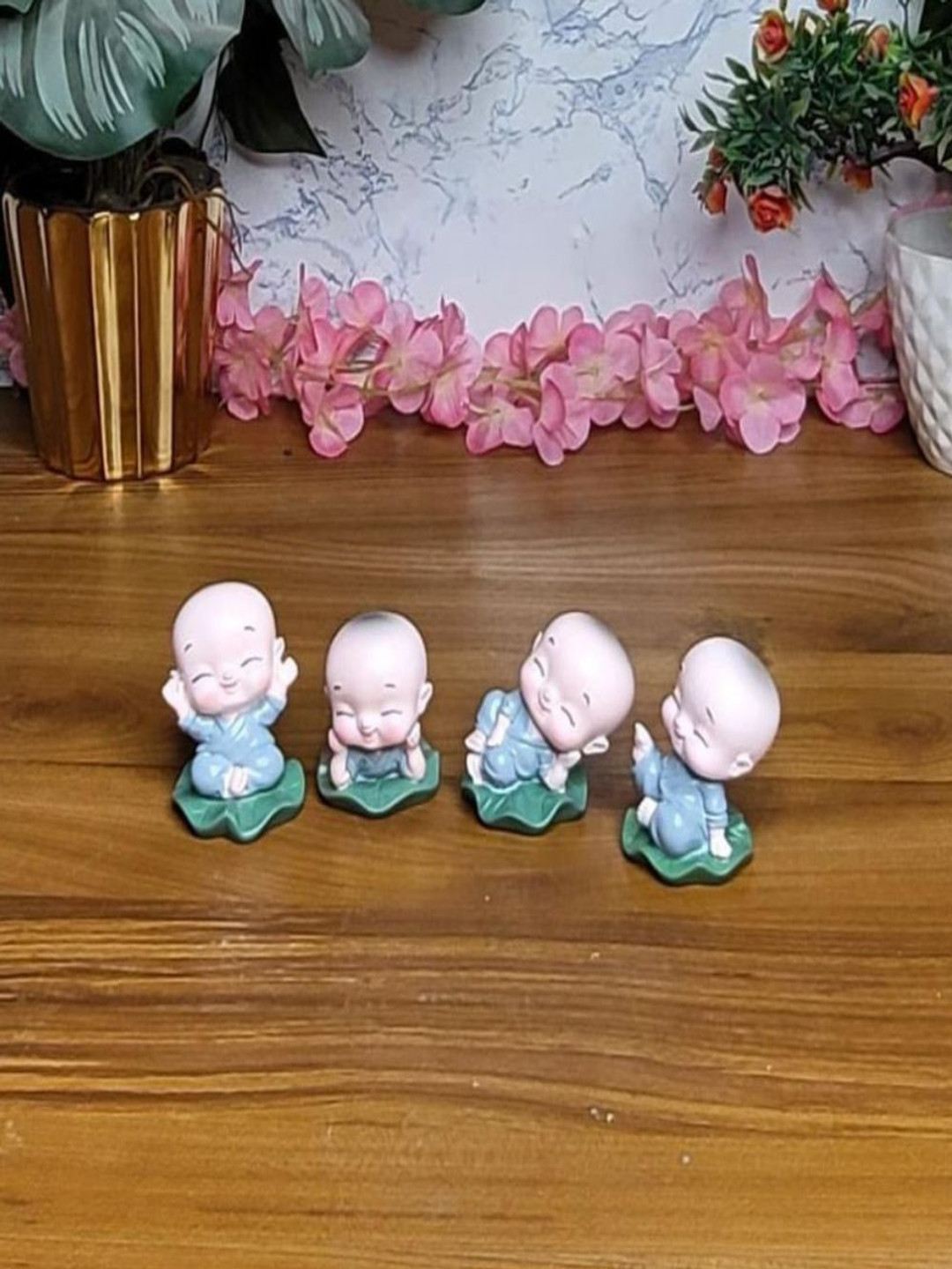 Wonderland Smiling Little Baby Monks Grey Polyresin Glossy Living Room Set of 4 Medium Showpieces - 2.2 Inches