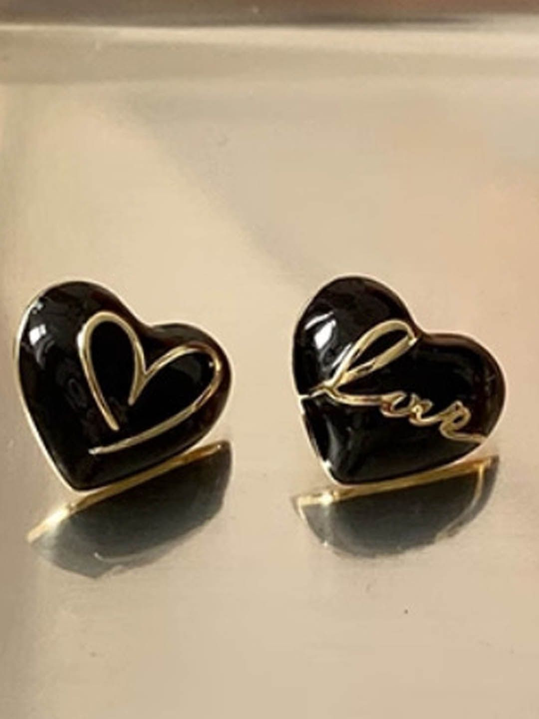 StyleCast Elegant Black And Silver-Toned Heart Shaped Studs