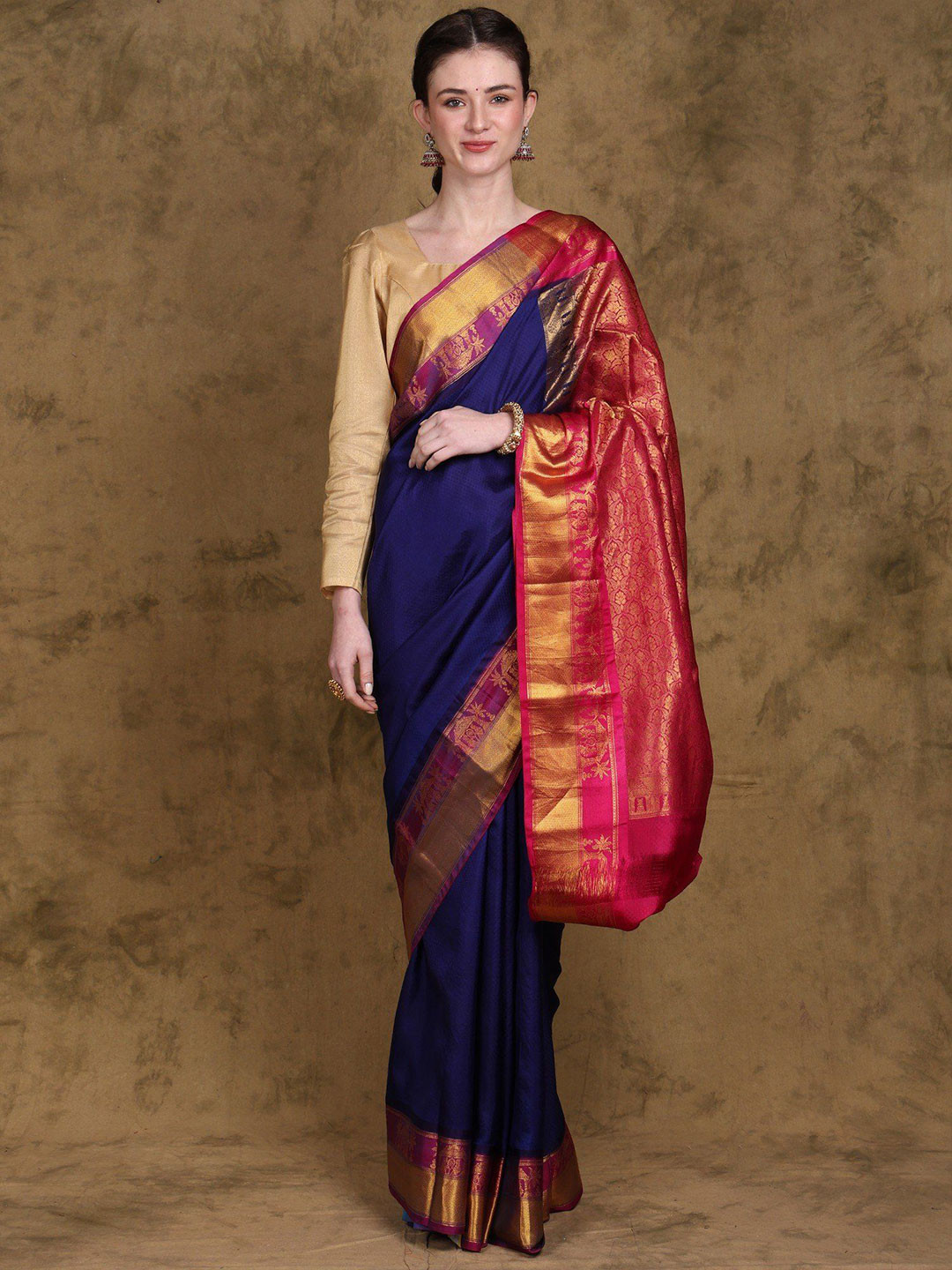 Exotic India Handloom Saree with Golden Thread work Wedding Scene Border