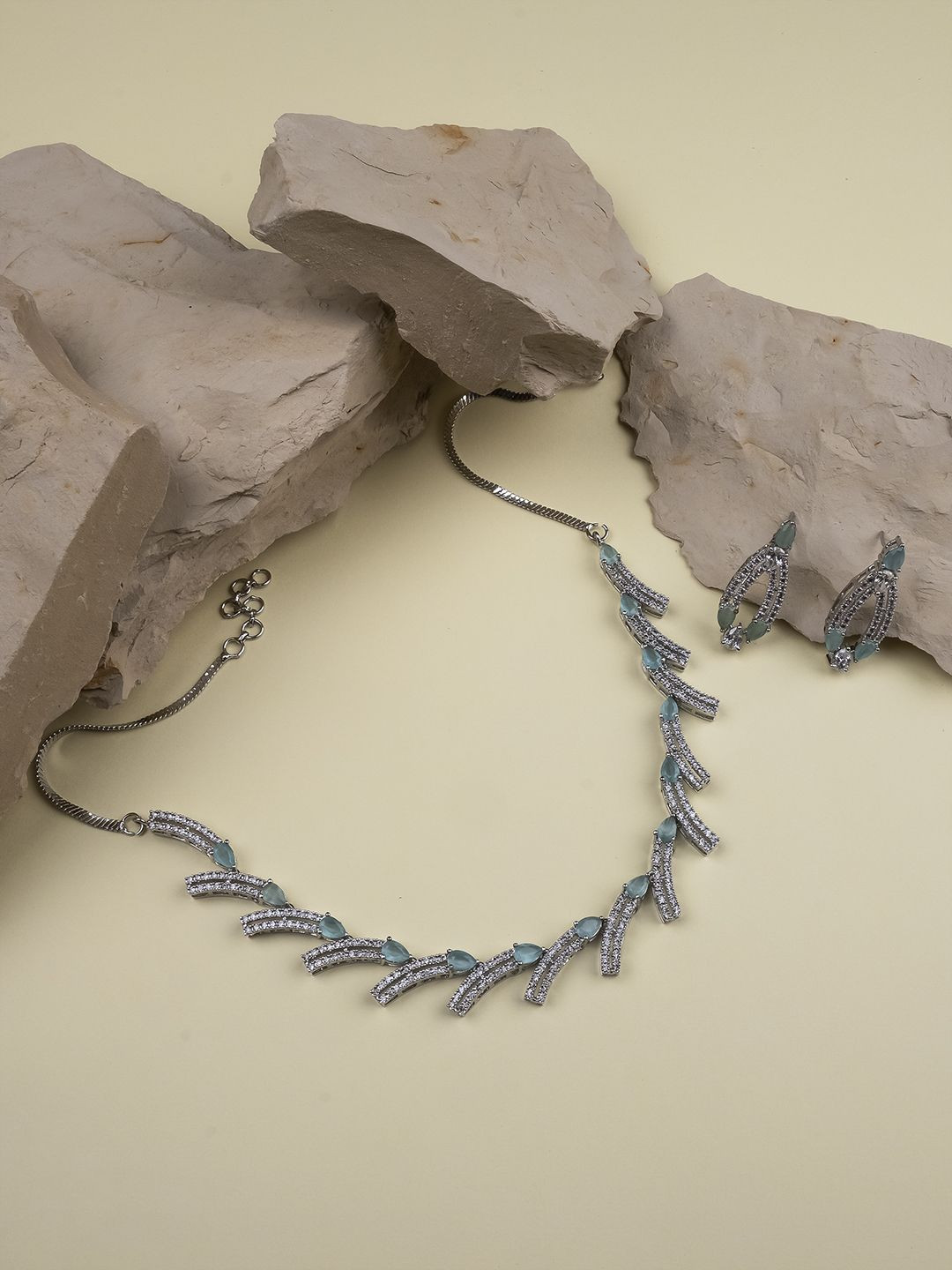 StileAdda Sleek Silver-Plated Turquoise American Diamond Studded Jewellery Set