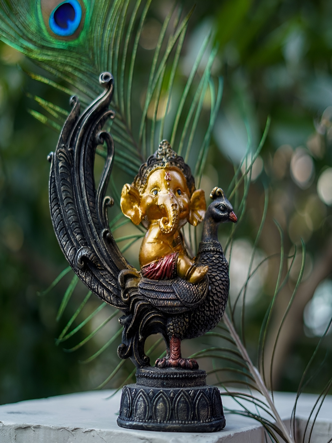 Craftlayout Sitting On Peacock Lord Ganesh Gold Polyresin Natural Prayer Room Large Showpiece - 9.1 Inches