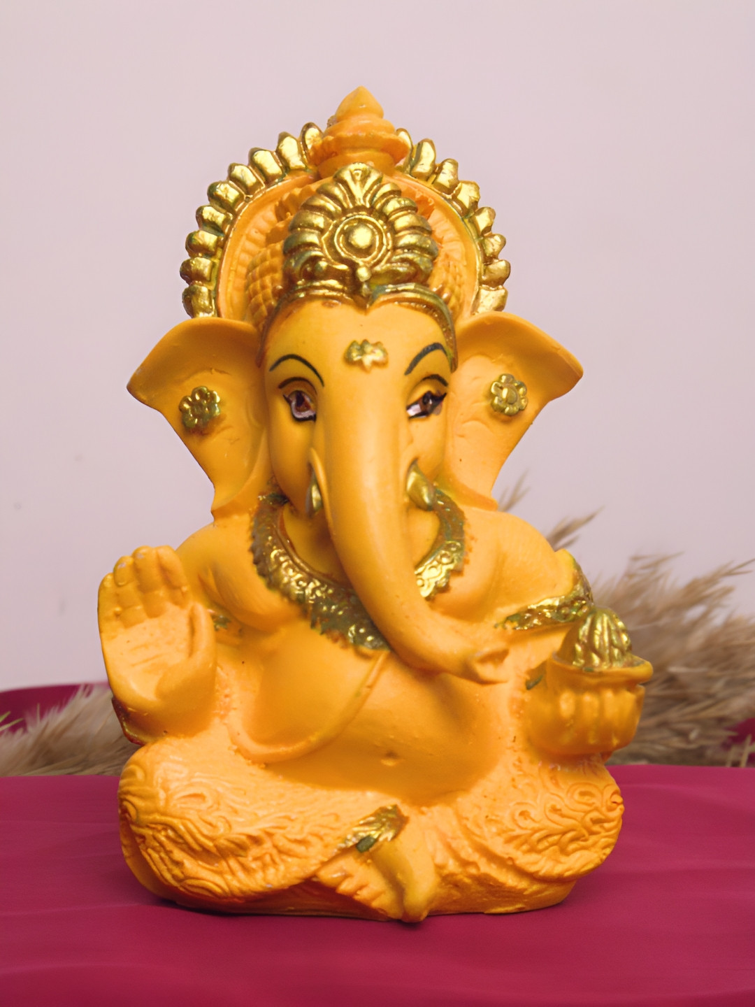 The Advitya Sitting Ganesha Yellow Resin Matte Prayer Room Medium Showpiece - 5.5 Inches