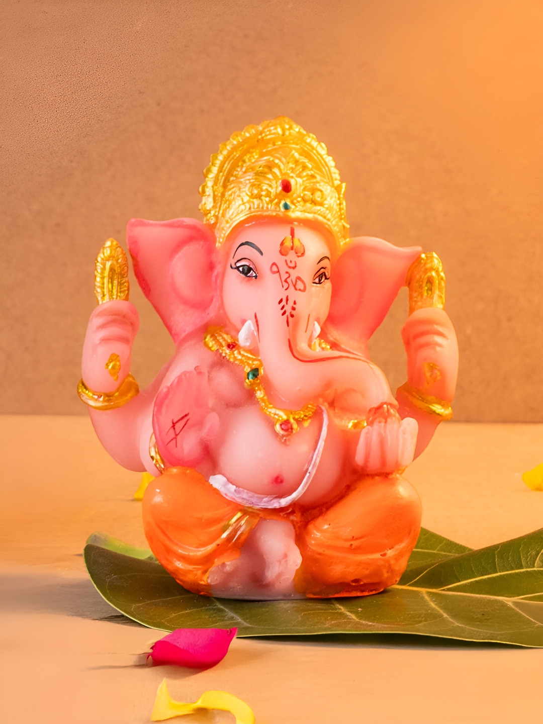 The Advitya Ganesha Orange Polyresin Natural Prayer Room Small Showpiece - 4.5 Inches