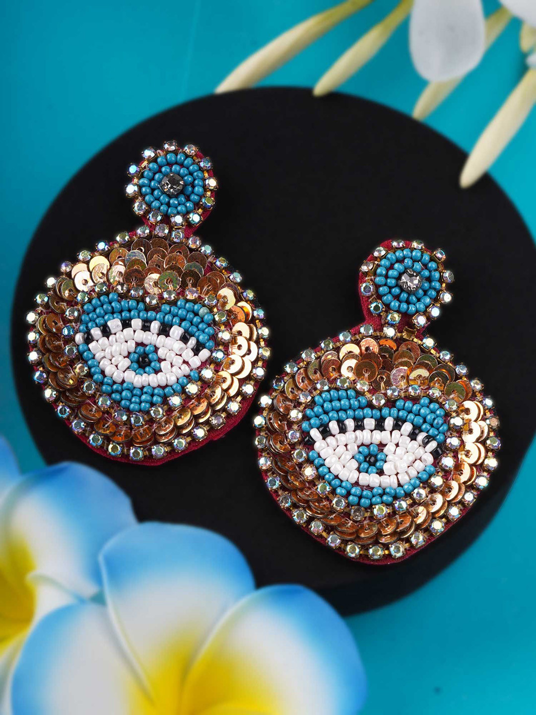 Sangria Blue Gold-Plated Artificial Stones Studded Oval Shaped Drop Earrings