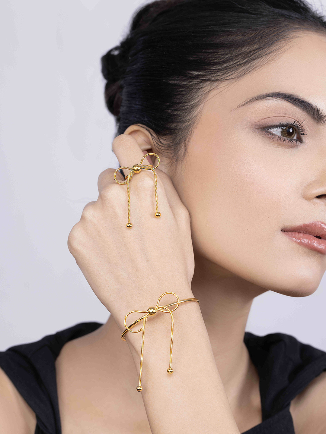 KAORI BY SHREYA AGARWAL Gold-Plated Stainless Steel Infinity Bow Knot Cuff Bracelet