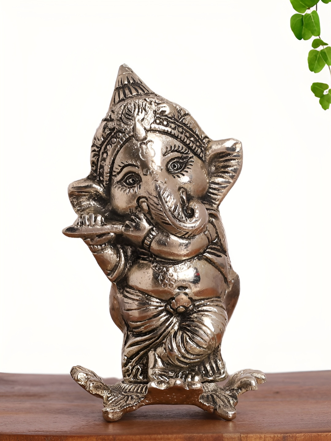 INTERNATIONAL GIFT Lord Ganesha Playing Flute Silver Aluminium Metallic Prayer Room Medium Showpiece - 2.4 Inches