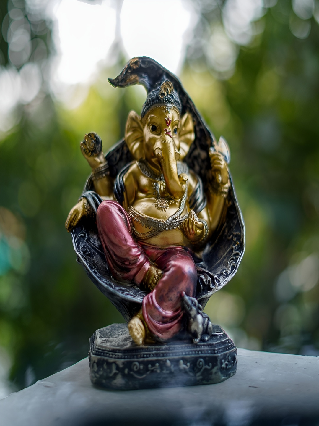 Craftlayout Sitting on Shankh Lord Ganesha Gold Polyresin Natural Prayer Room Hand-Crafted Medium Showpiece - 7.9 Inches