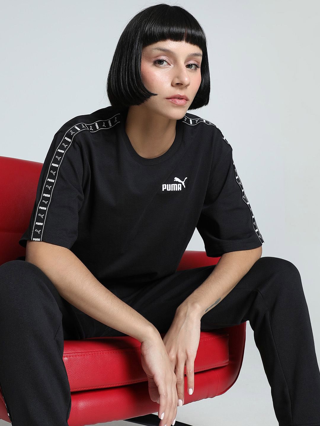 Puma Women Tape Solid Pure Cotton Relaxed Fit Short Sleeve T-Shirt