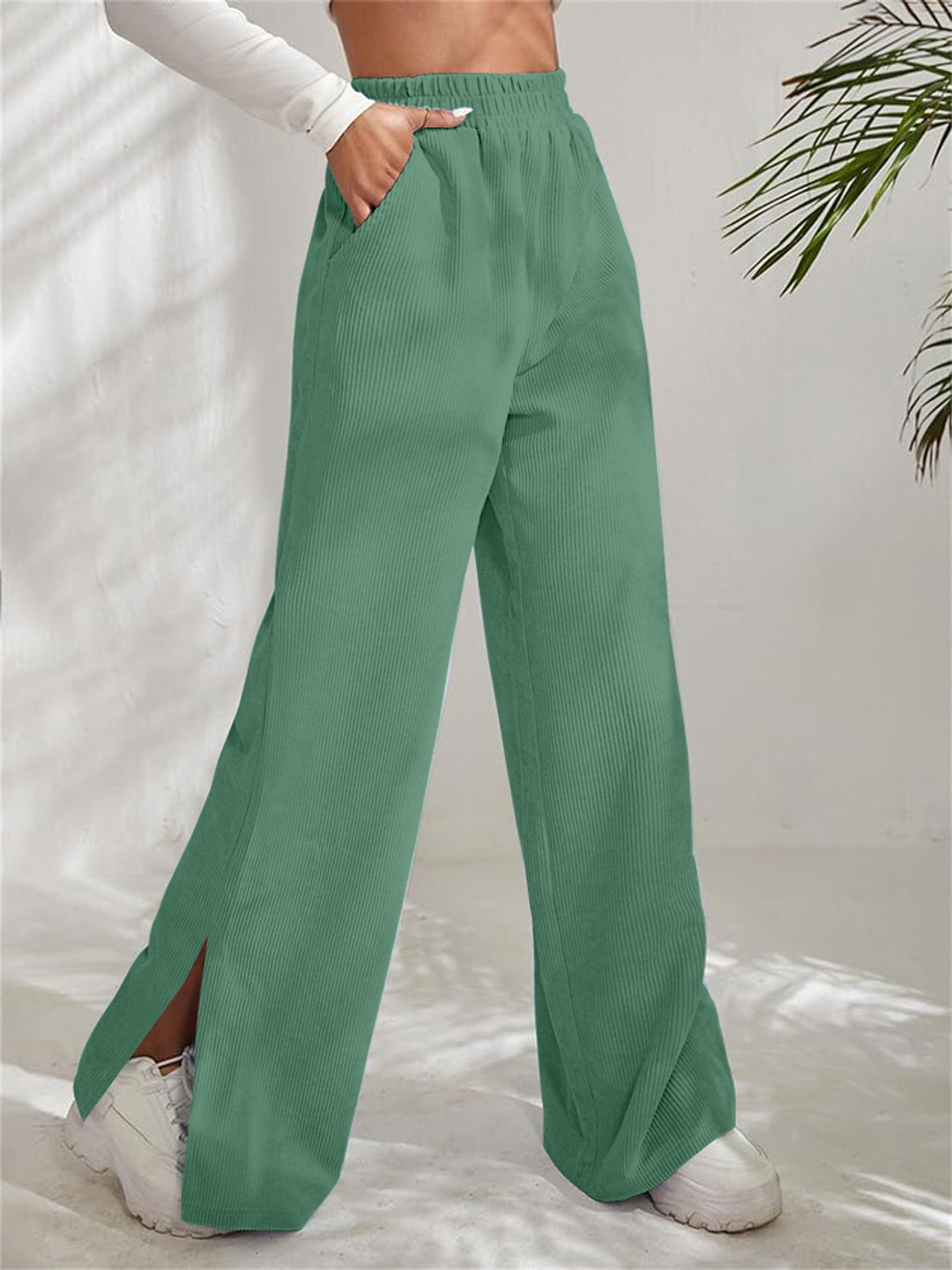 Kalika Women Loose Fit Mid-Rise Flared Trousers