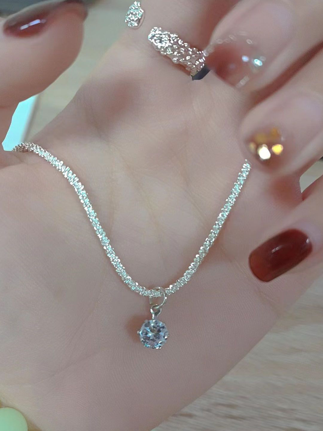 StyleCast Elegant Silver-Toned Stone Studded Circular Pendant with Chain