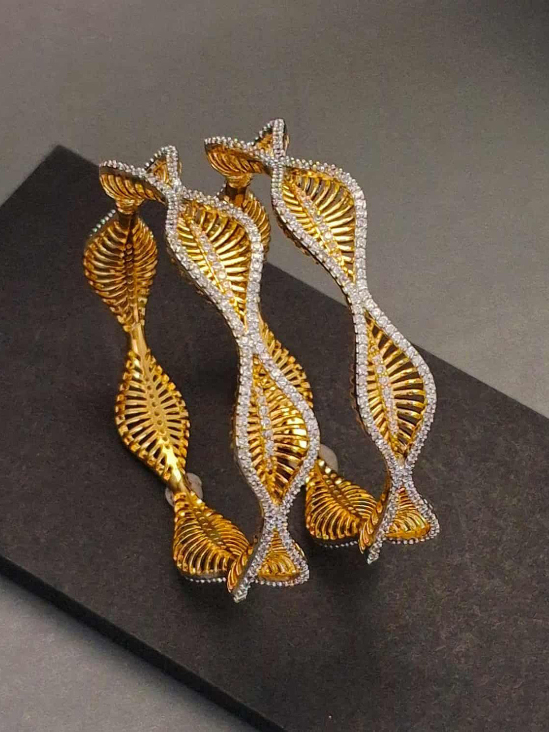 Zevarly Set of 2 Gold Plated Cubic Zirconia Stone-Studded SwirlBangles