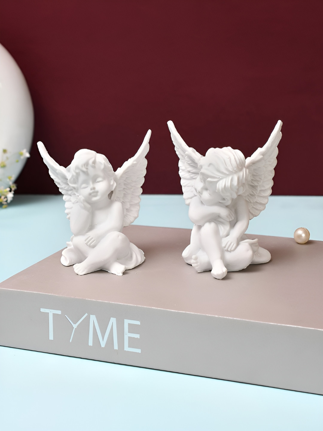 Myntra Elegant Homes Cute Sleepling Angel Baby White Polyresin Glossy Living Room Set of 2 Small Showpieces - 3.7 Inches
