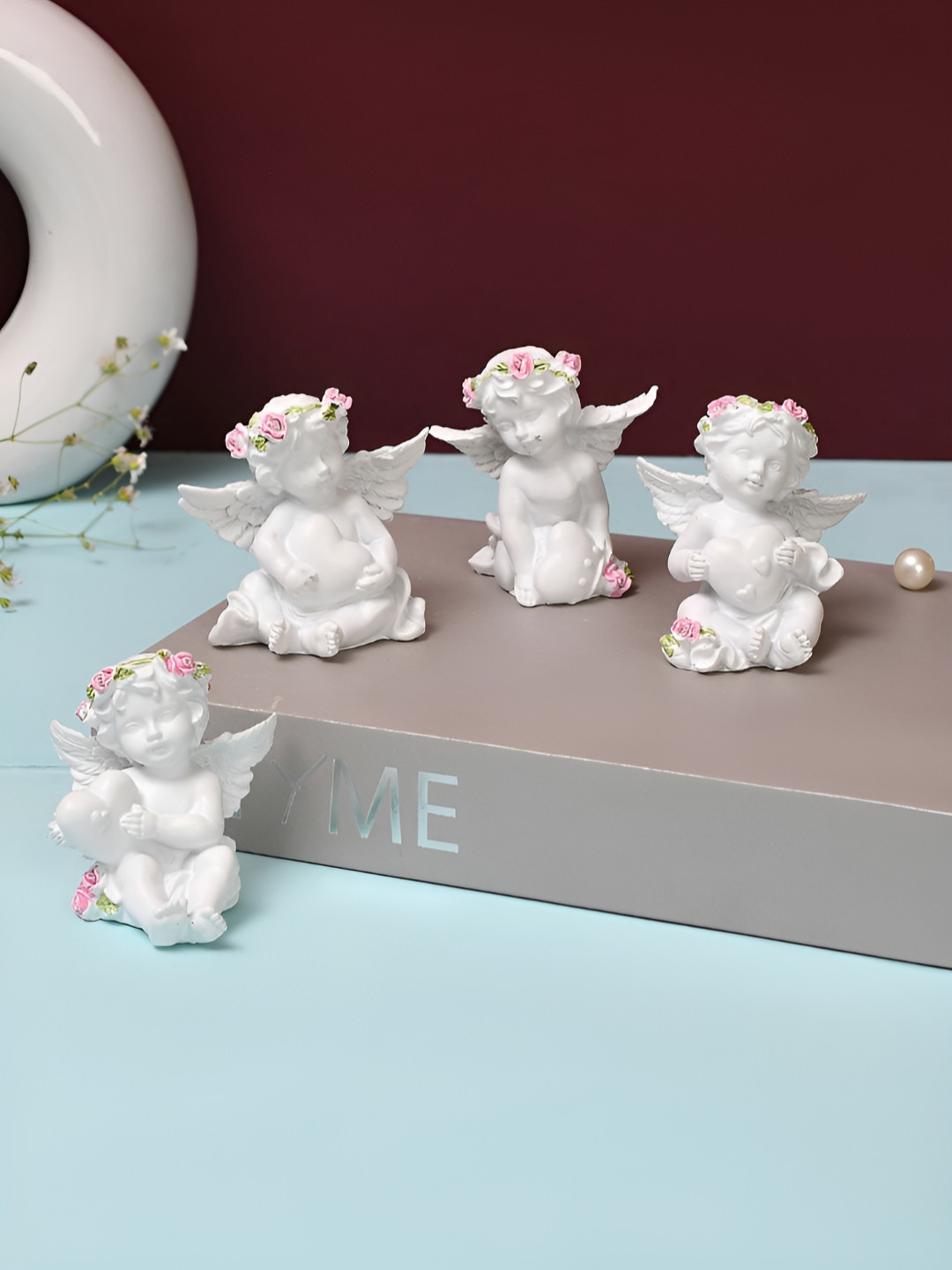 Myntra Elegant Homes Angel with Heart Motifs White Polyresin Matte Living Room Set of 4 Tiny Showpieces - 2.6 Inches