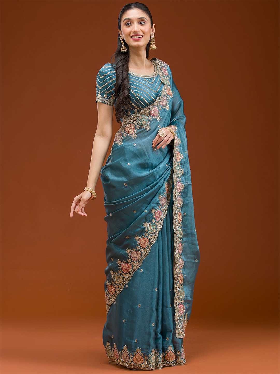 Koskii Peacock Blue Zari work Tissue Saree