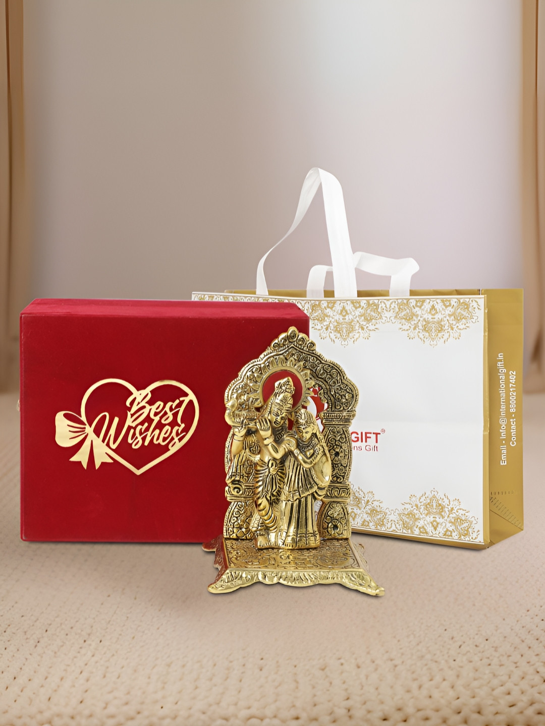 INTERNATIONAL GIFT Radha Krishna with Box, Bag and 'Best Wishes' Personalized Tag Gold Metal Metallic Prayer Room Medium Showpiece - 6.5 Inches