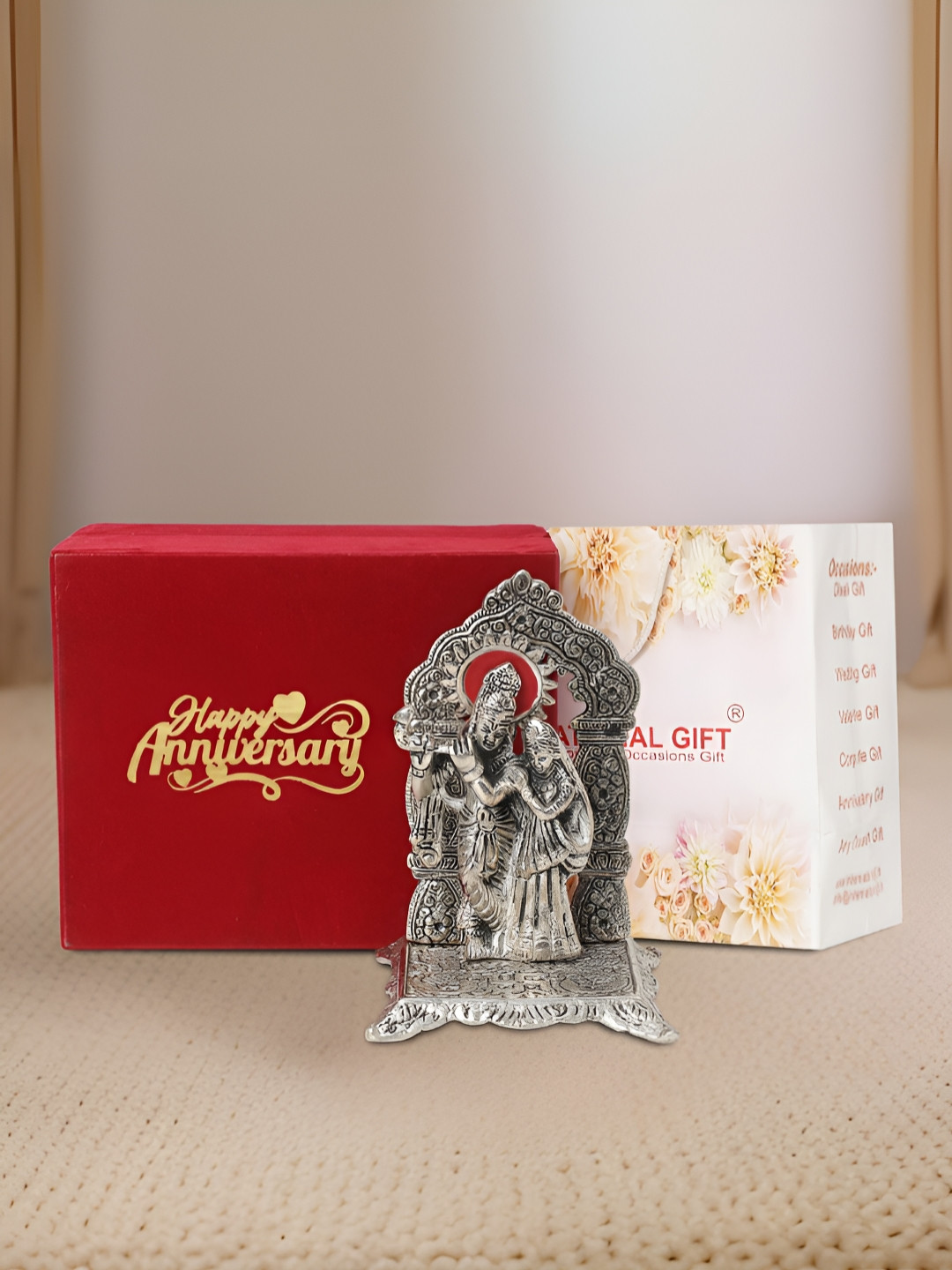 INTERNATIONAL GIFT Radha Krishna with Box, Bag & Happy Anniversary Personalized Tag Silver Metal Metallic Prayer Room Medium Showpiece - 6.5 Inches