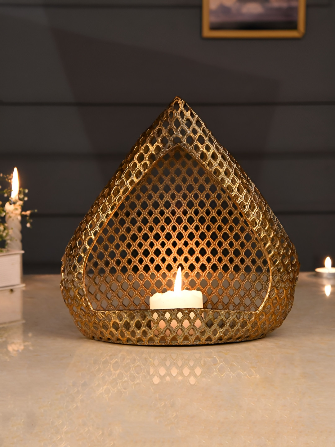 Myntra Elegant Homes Moroccan Gold-Toned Textured Metal Candle Holder