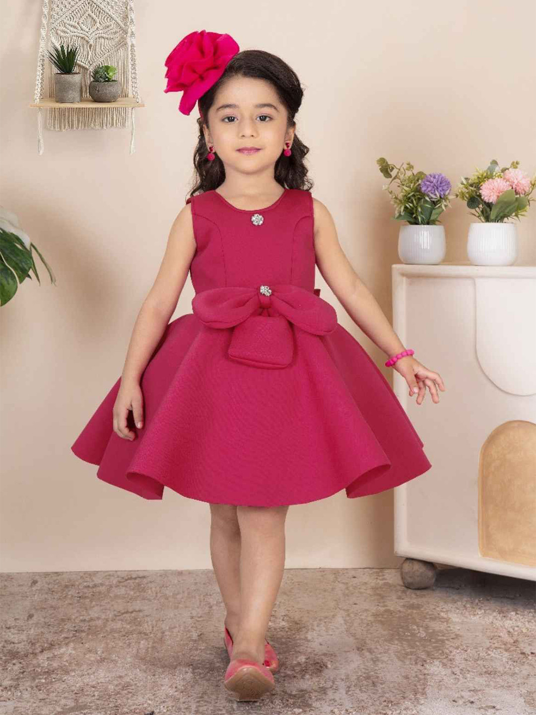 Lagorii Girls Sleeveless Embellished With Bow And Stone Frock - Rani Pink Dress