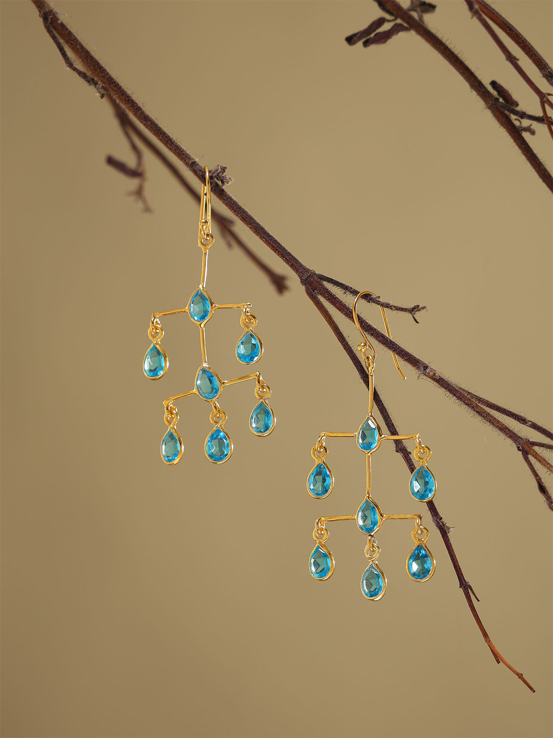 Exotic India Sterling Silver Gold-Plated Topaz Chandelier Teardrop Shaped Drop Earrings