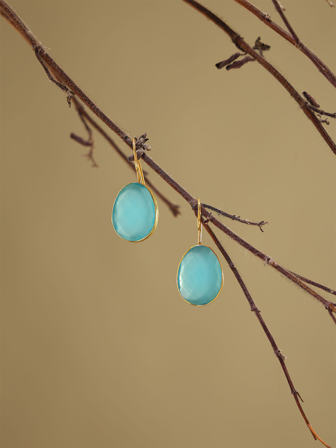 Exotic India Sterling Silver Gold-Plated Faceted Chalcedony Oval Drop Earrings
