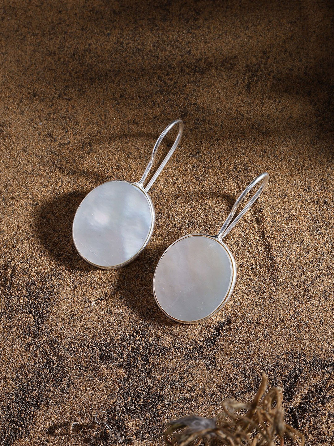 Exotic India Sterling Silver Mother of Pearl Oval Drop Earrings