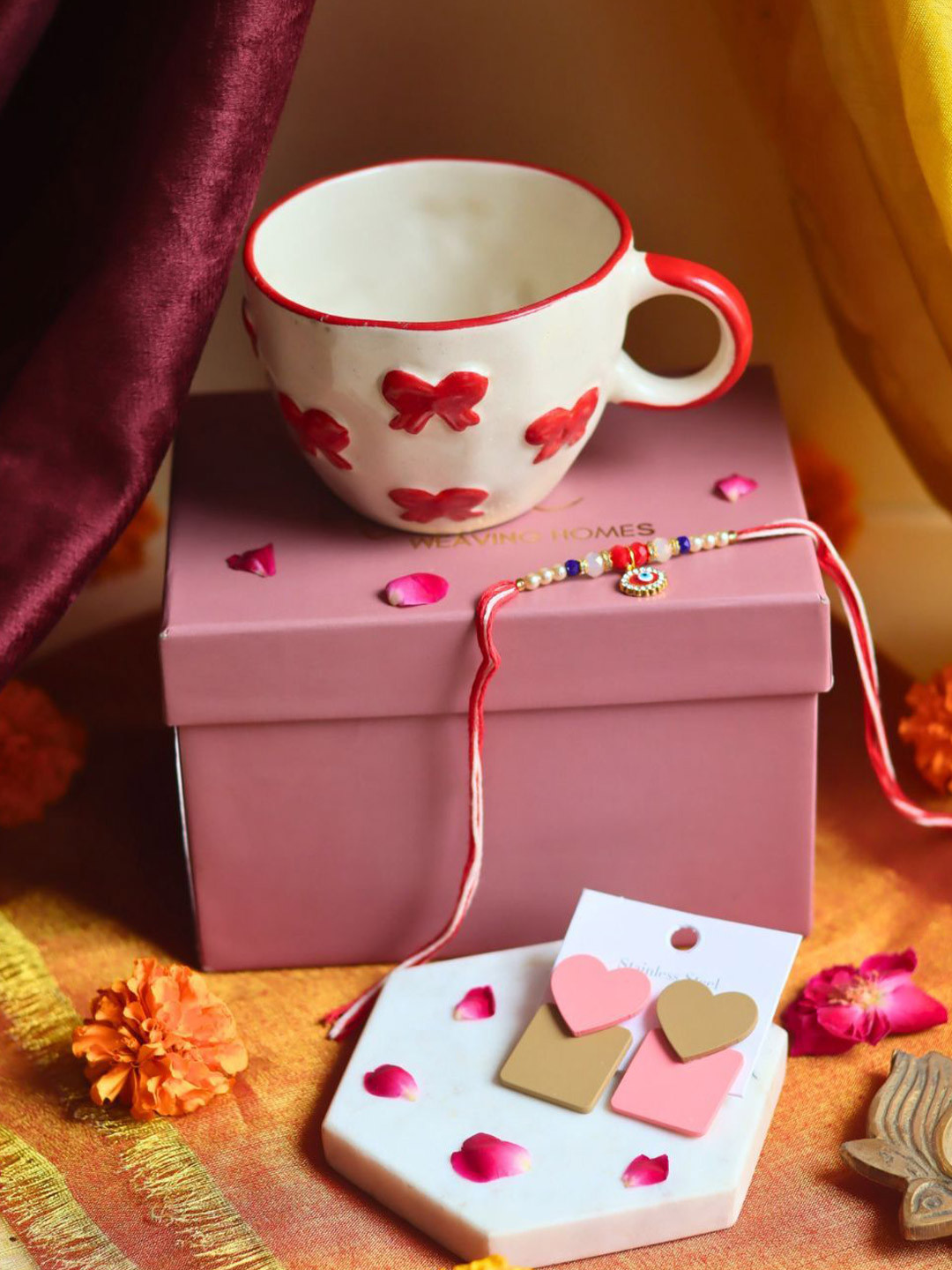 WEAVING HOMES Stone Studded & Beaded Thread Rakhi With Bow Mug & Earrings