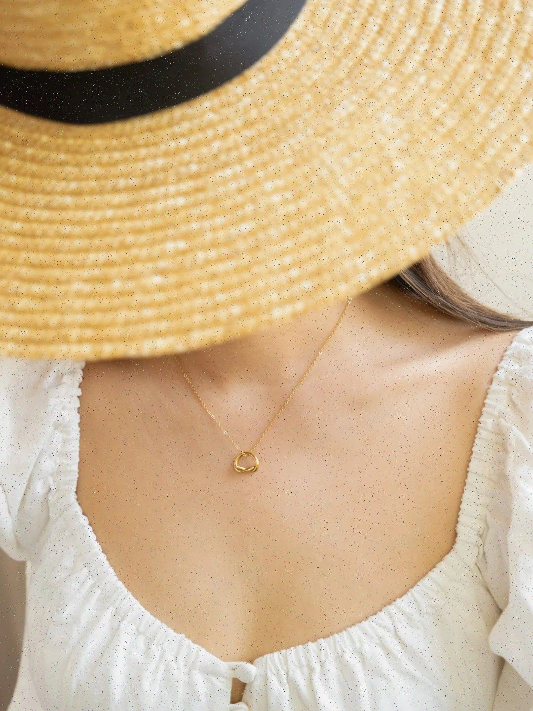 OUZEL Stainless Steel 18KT Gold-Plated Love Knot Shaped Pendant With Chain