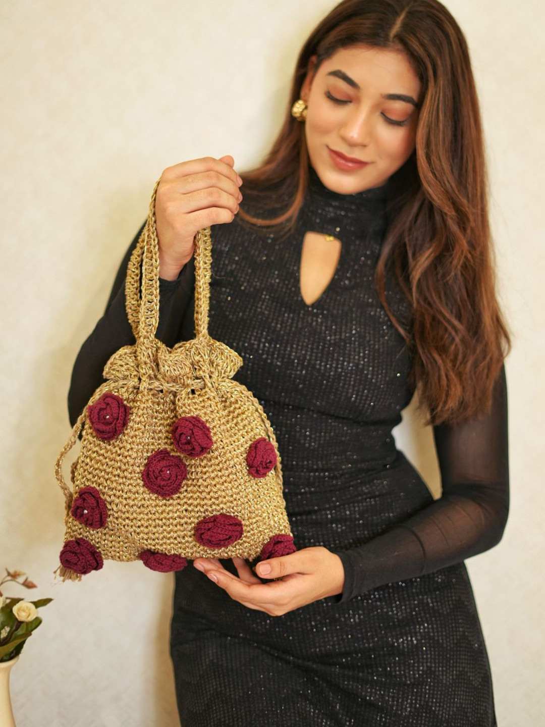 ITIHASIKALA Twilight Rosette Structured Handheld Jute Crochet Potli Bag with Tasselled