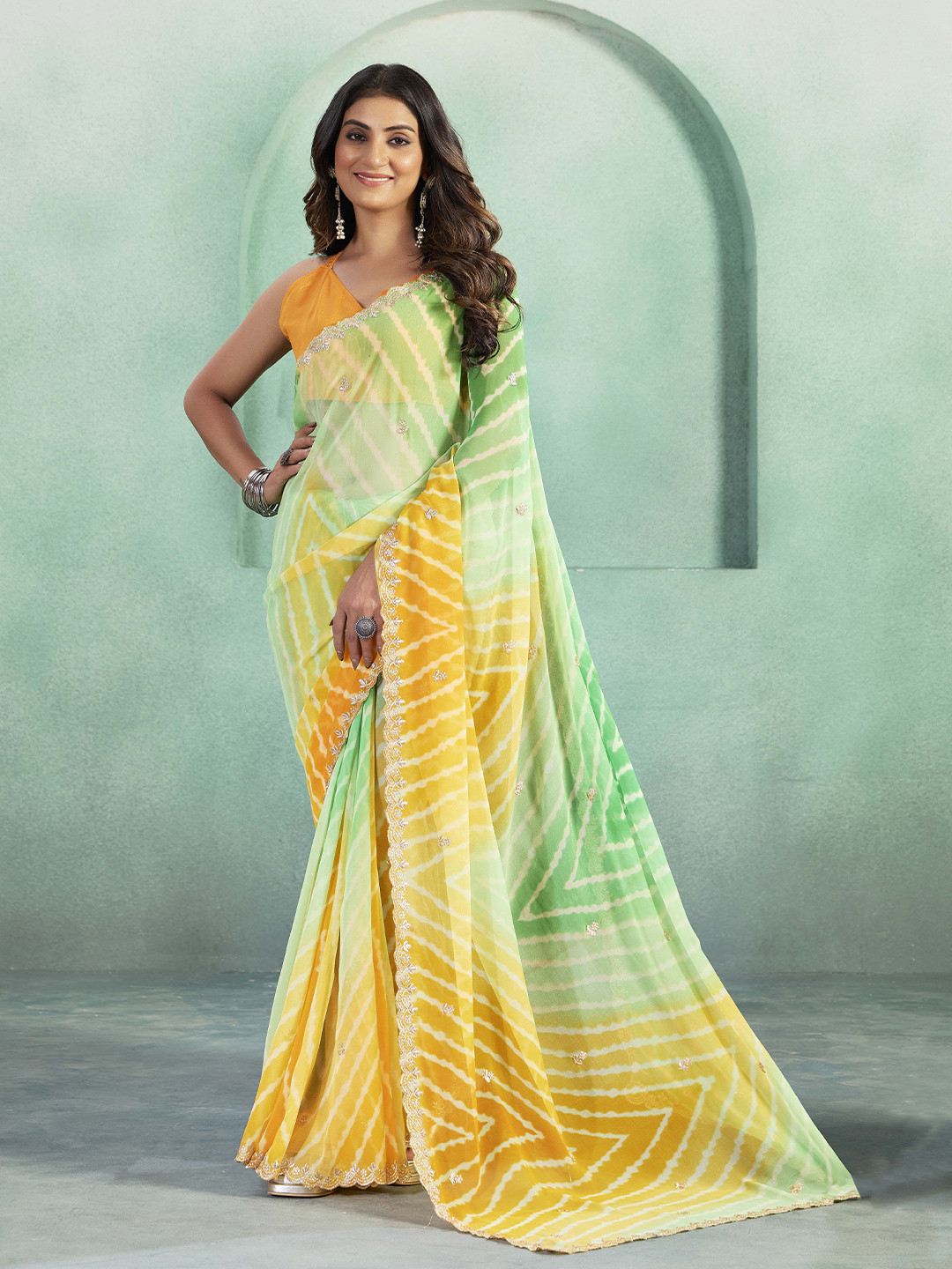 Kalista Embroidered Embellished Lehriya Georgette Saree