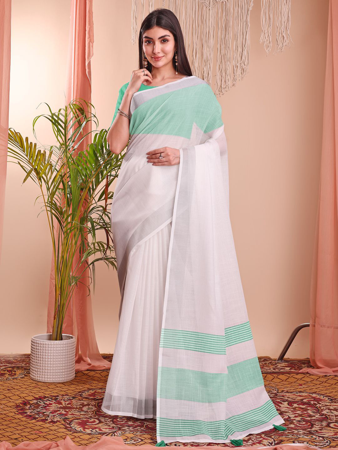Astita Women Saree with Subtle Woven Stripes and Contrast Border