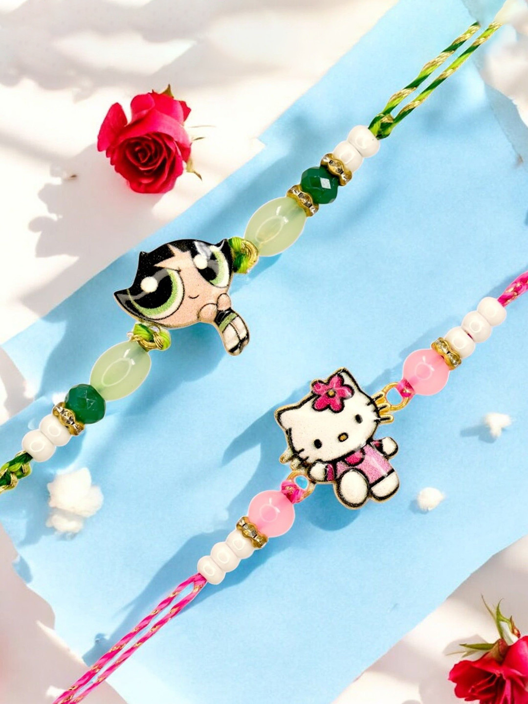 MEIRA JEWELLERY Kids Set Of 2 Thread Rakhis With Greeting Card & Roli Chawal