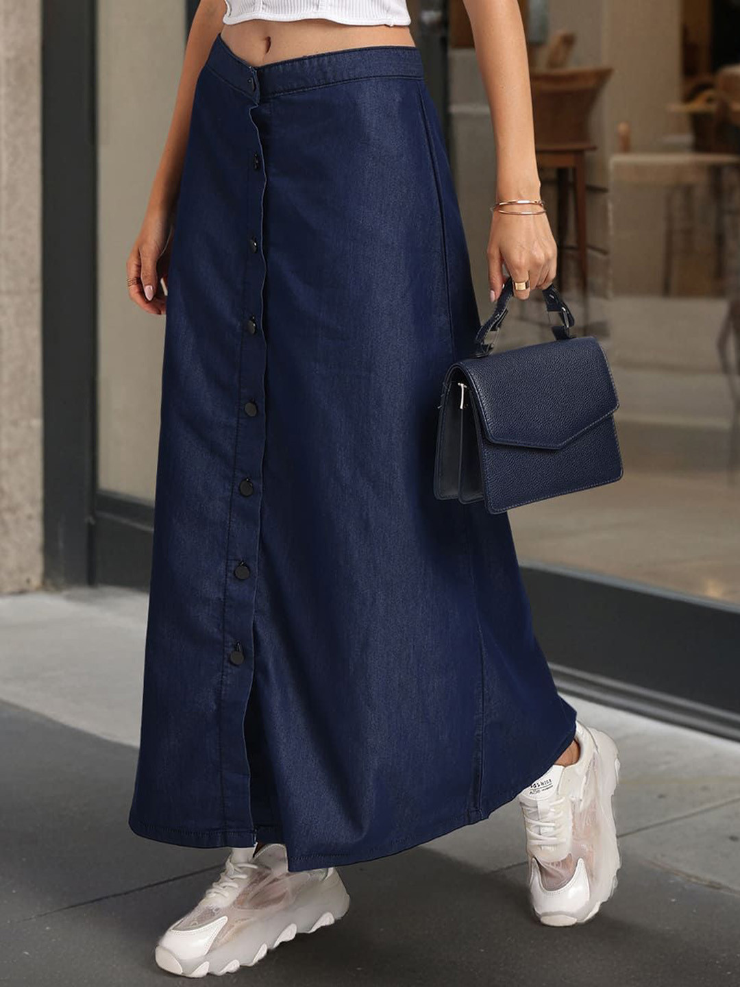 <p>Blue solid A-line maxi skirt, has a button closure, and a straight hem</p>