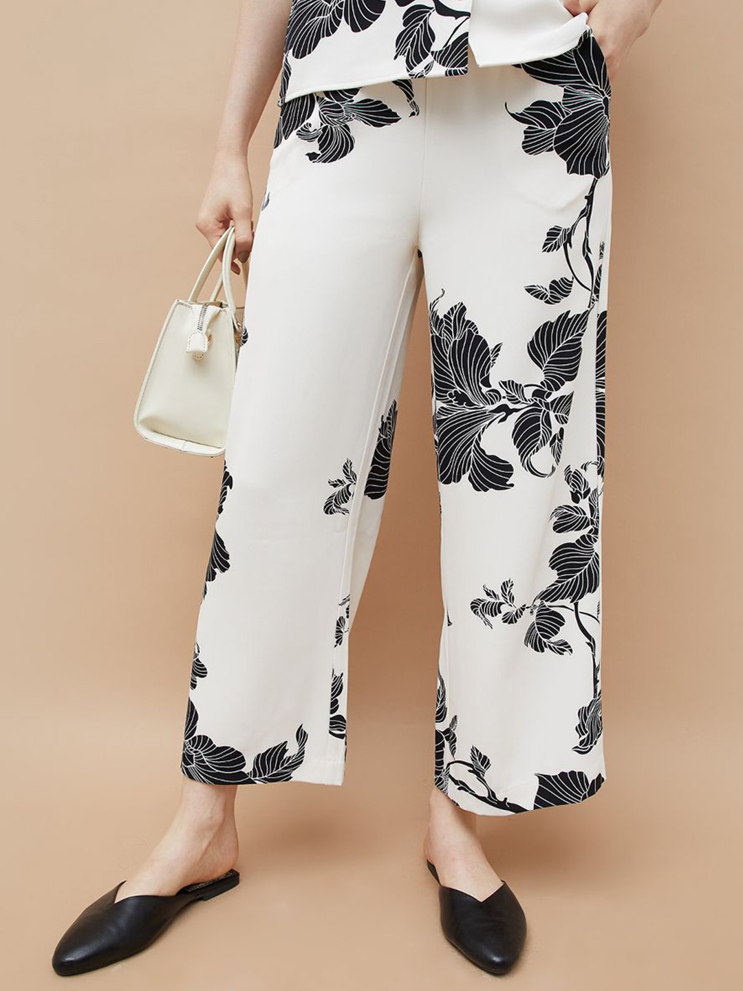CODE by Lifestyle Women Floral Printed Mid-Rise Flat-Front Regular Trousers
