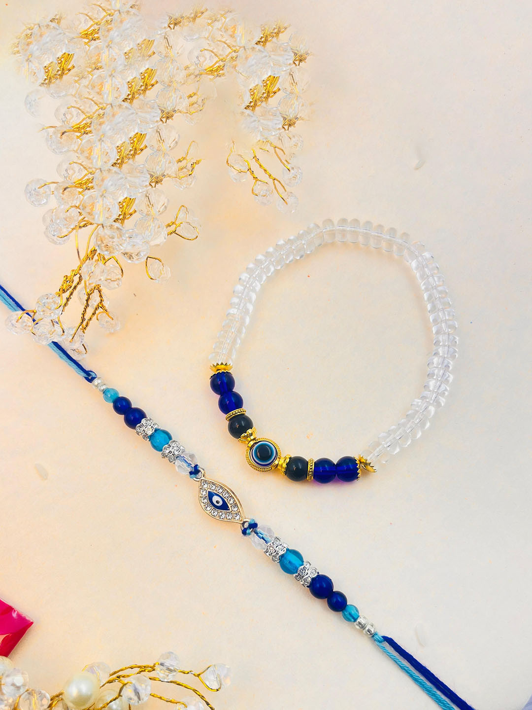 TANAIRA Artificial Stnes Studded & Beaded Evil Eye Bhaiya Bhabhi Rakhis With Roli Chawal